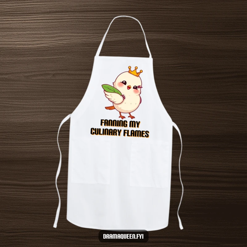 Funny apron with a royal bird wearing a crown, fanning itself with a leaf, ready for dramatic kitchen duties.