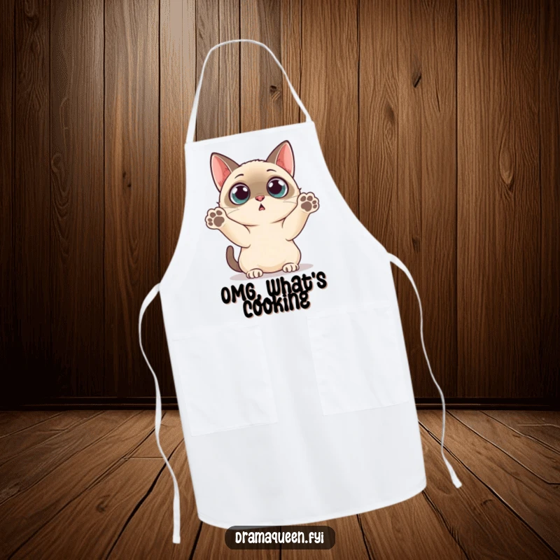 Funny Apron: Siamese cat looking surprised with wide eyes and paws up, ready for kitchen chaos.