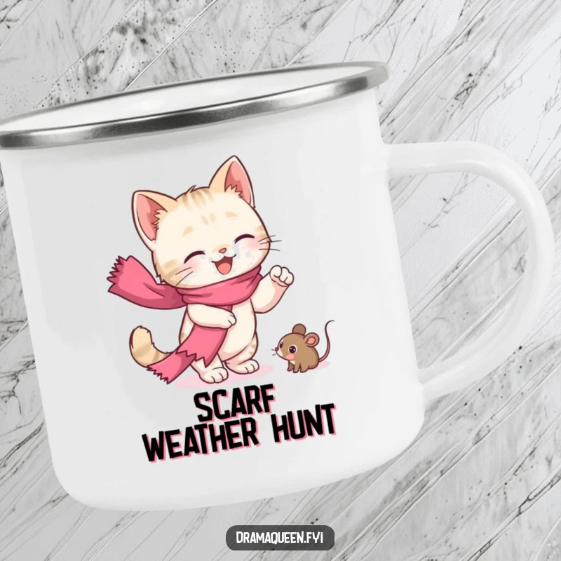 Funny kitten camping mug, enamel, showing a cute scarf-wearing cat dramatically reaching for a toy mouse, for outdoor fun.
