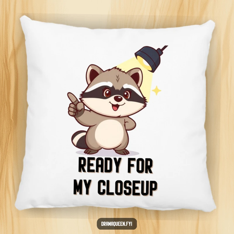 Funny pillow showcasing a mischievous raccoon pointing to a spotlight overhead, offering humorous comfort and playful drama.