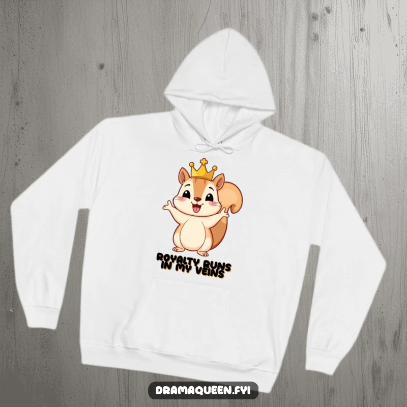 Funny hoodie showcasing a cheerful squirrel wearing a tiny crown, making a grand gesture with its paw, a comical and regal woodland friend.