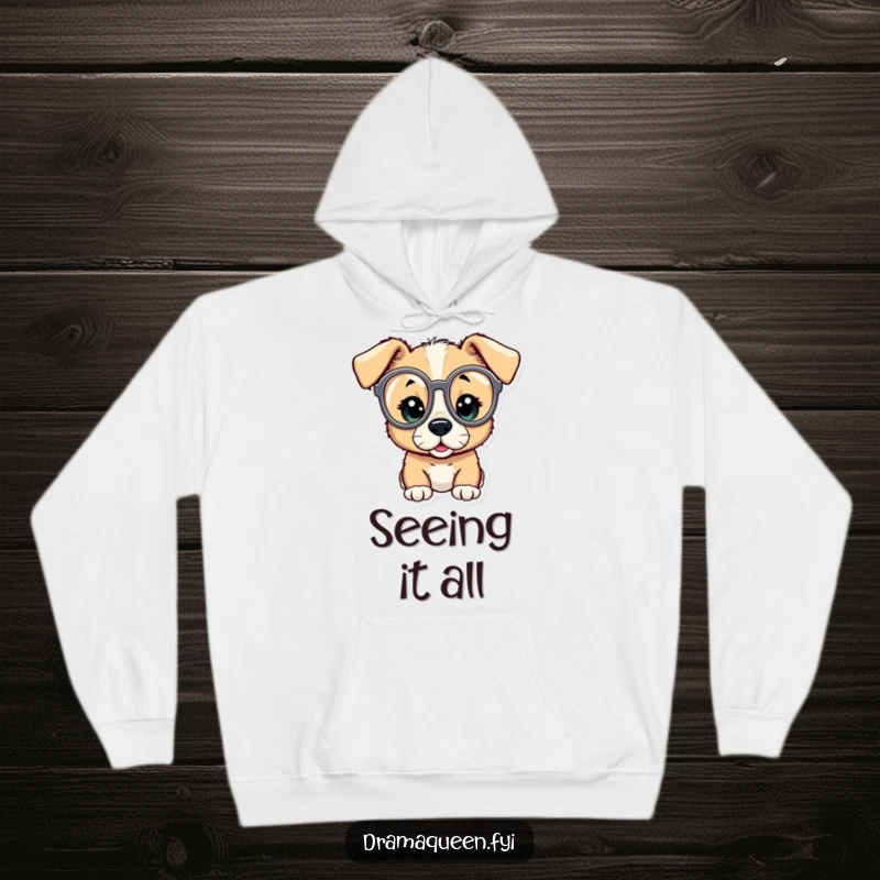 Funny hoodie featuring a curious puppy character using oversized opera glasses to look amazed, capturing a moment of wonder.