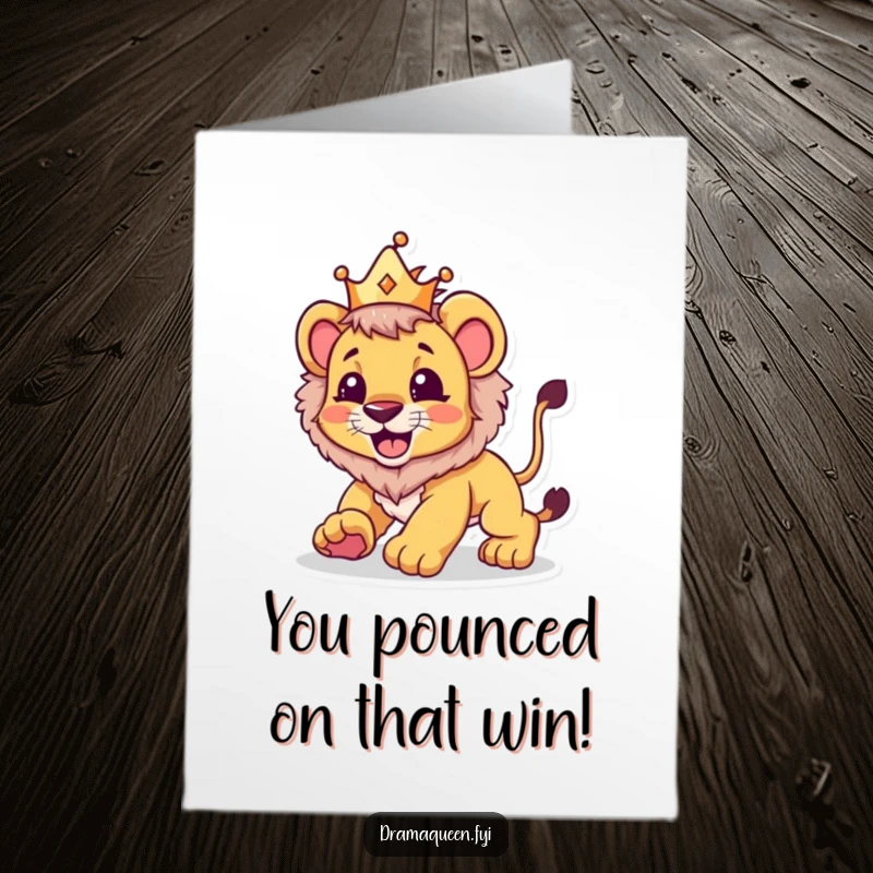 Funny Free Printable Congratulations Card: A beaming lion cub wearing a small crown playfully pounces triumphantly.
