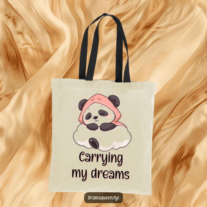 Funny tote bag depicting a panda wearing a cape napping on a cloud, perfect for carrying essentials with peaceful charm.