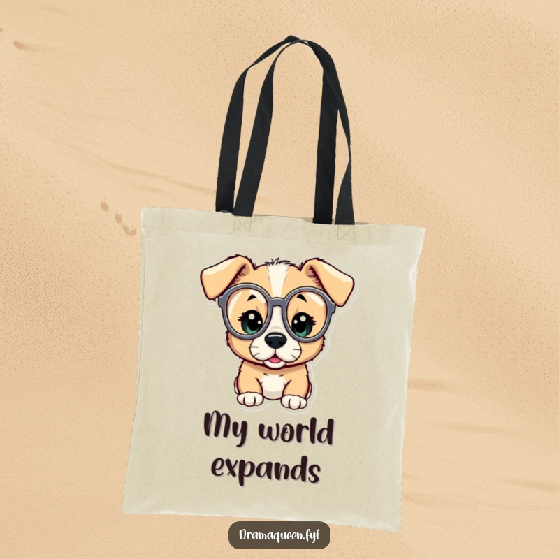 Funny tote bag featuring a curious puppy peeking through oversized opera glasses, displaying an expression of utter amazement.